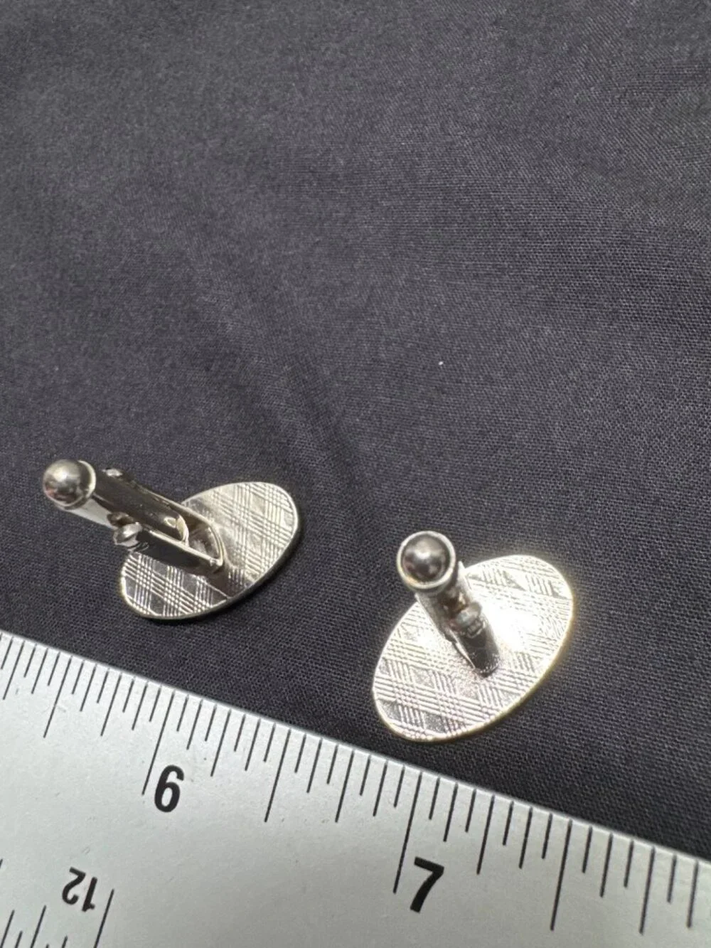 Silver Oval Cufflinks With Textured Back & Single Diamond Accent For Men